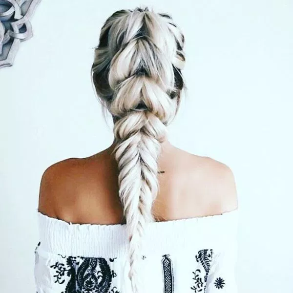 High ponytail with a fishtail braid