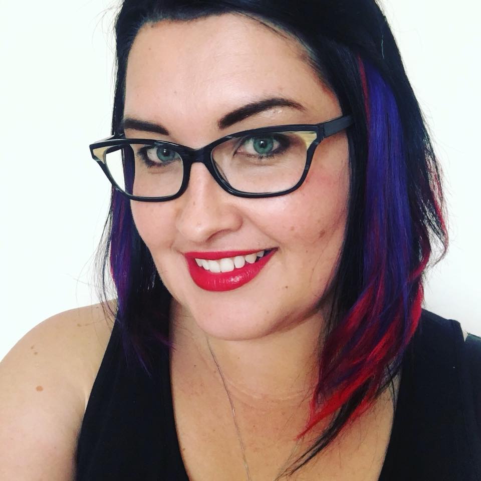 Dr. Emma Beckett with colored hair extensions